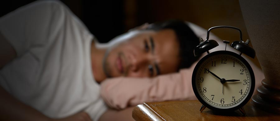 man in recovery suffering from insomnia
