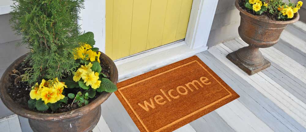 welcome mat at sober living home