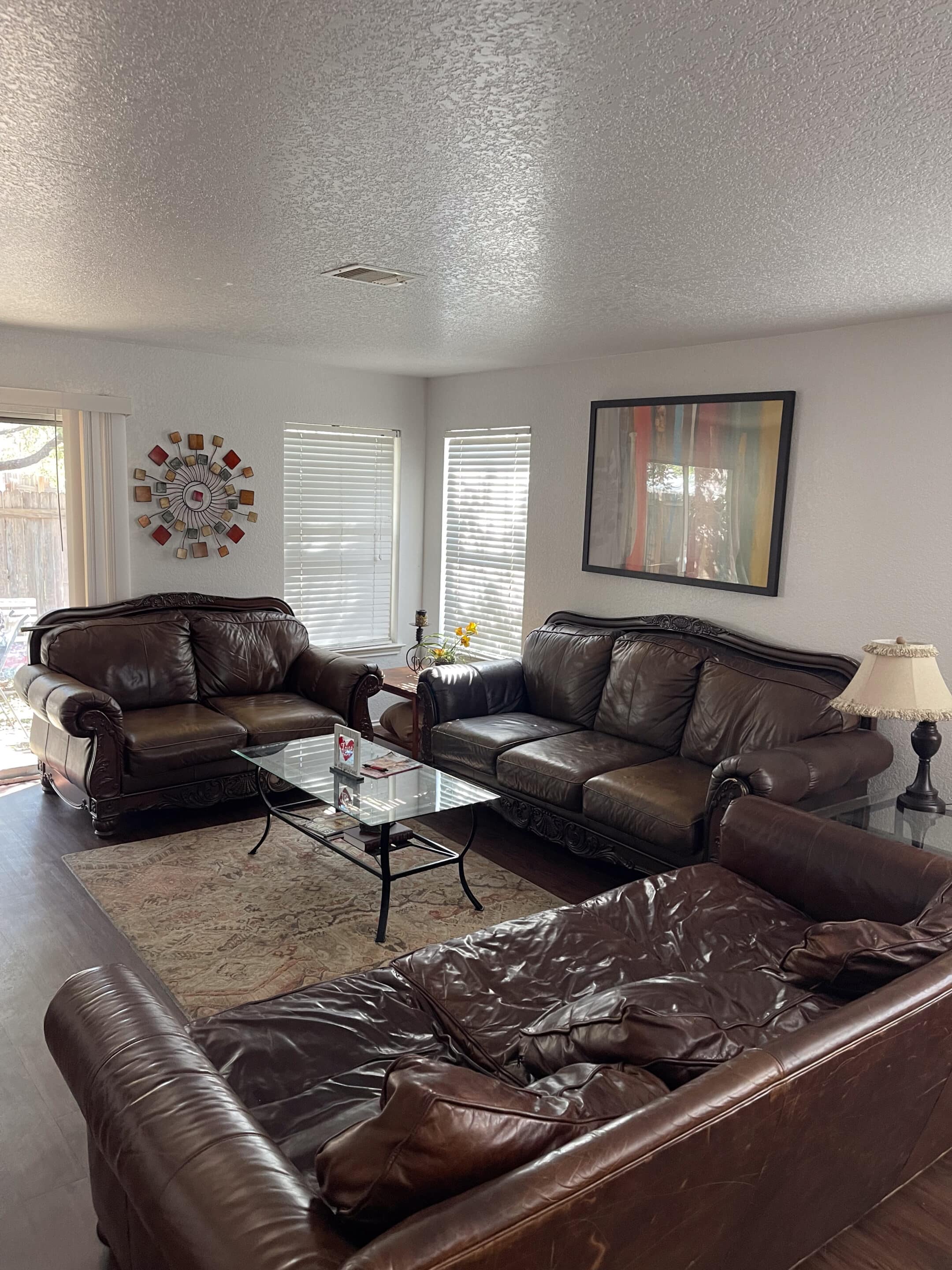 Bright living room in San Antonio sober living home at Eudaimonia Recovery Homes.
