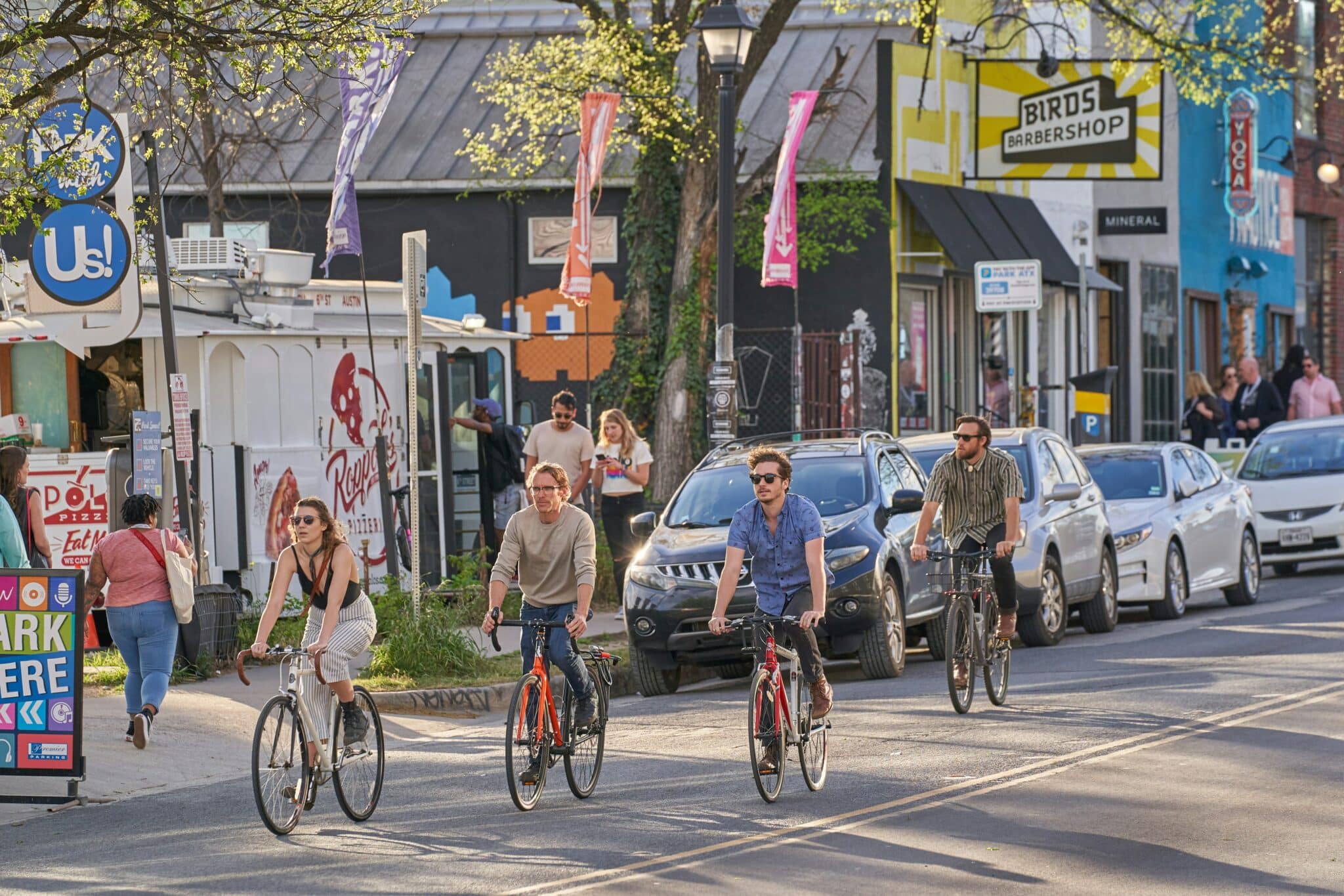 Sober living Austin community enjoying bikes and food trucks