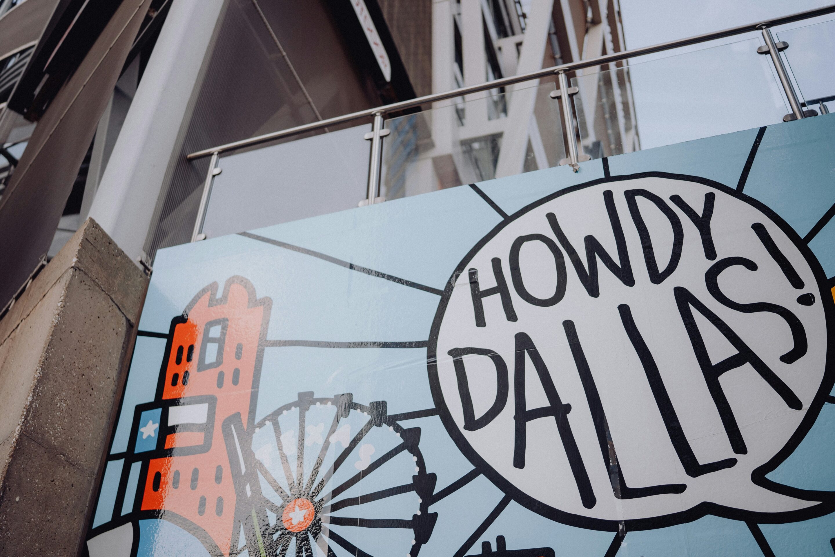 Howdy Dallas mural welcoming residents to sober living homes in Dallas, Texas.