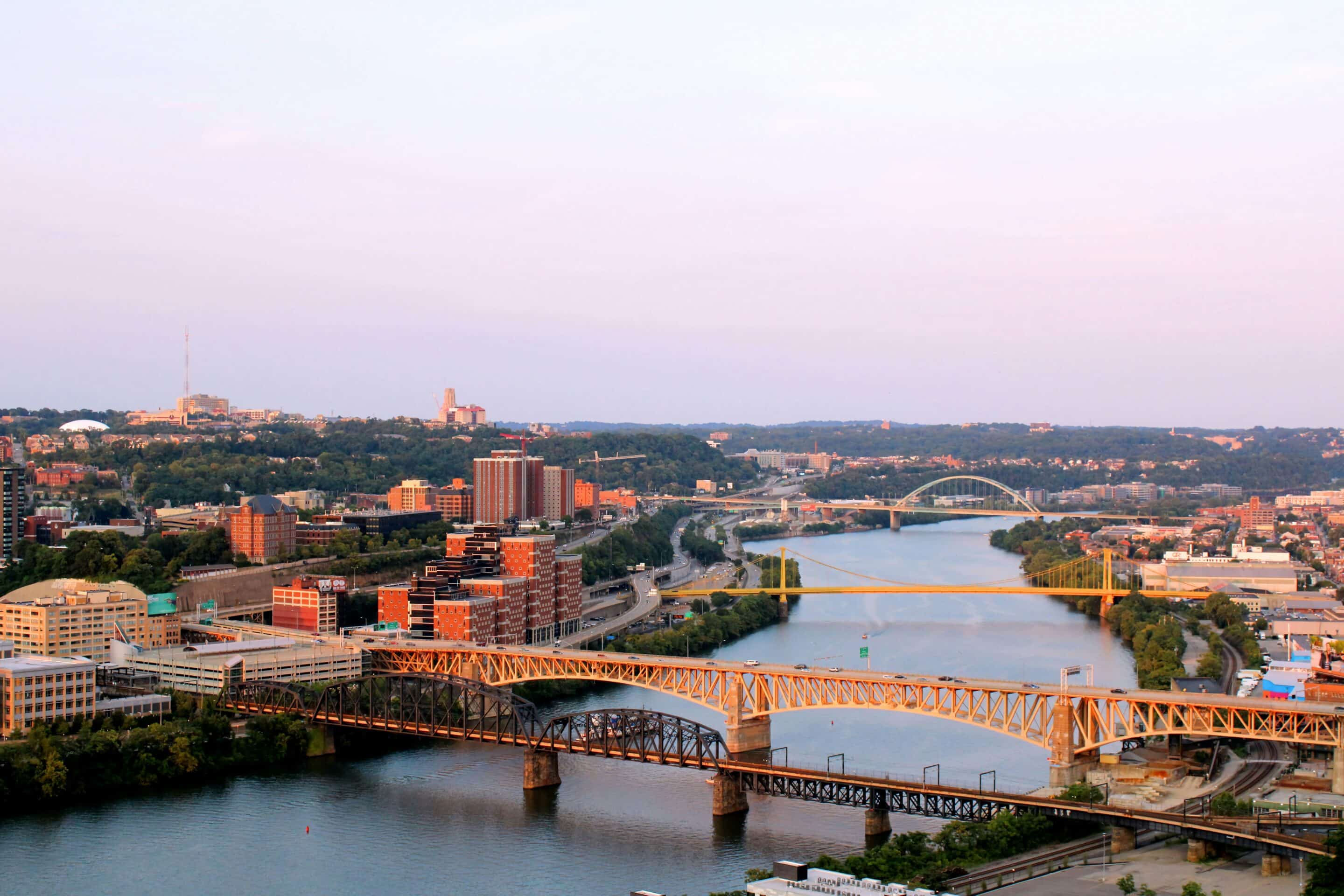 Mississippi River bridges in Memphis highlighting connection and transition, symbolic of sober living programs.