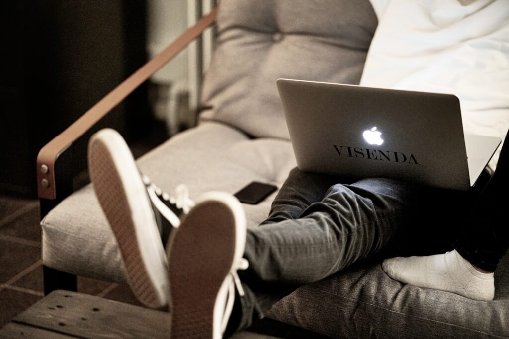 Person attending virtual therapy session at home - Photo by Jonas Allert on Unsplash