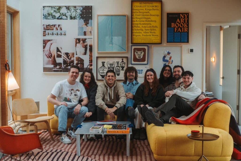 A group of people sitting on a couch -- Photo by Michael Proctor on Unsplash