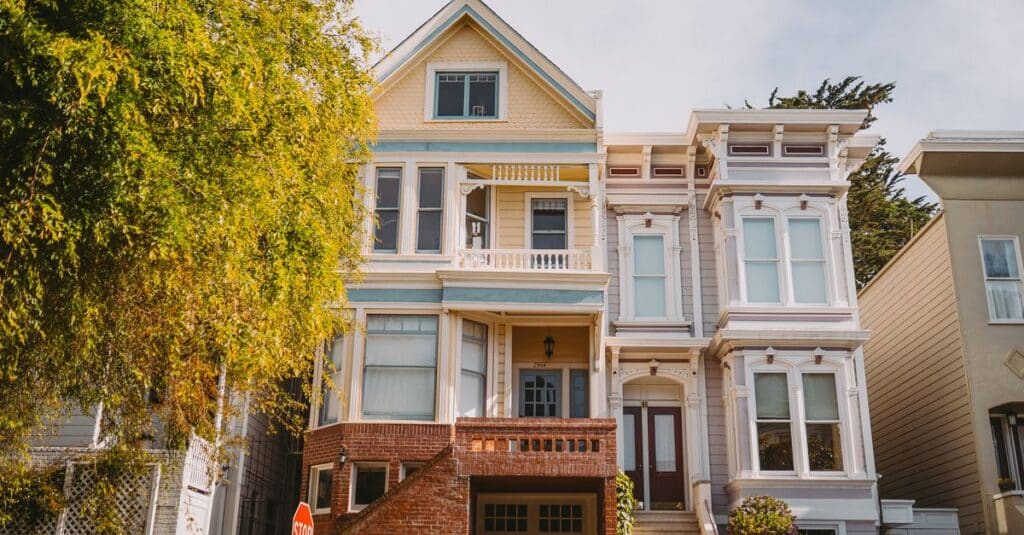 Front view of a charming Victorian townhouse capturing classic architecture and urban aesthetics.
