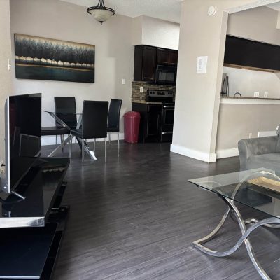 Kitchen and dining area in affordable men’s sober apartment Austin TX