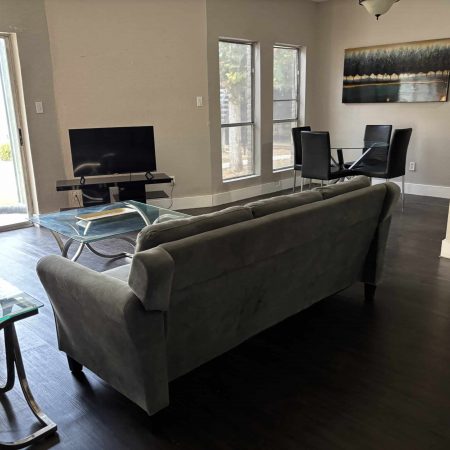 Budget men’s sober housing with two bunk sets and natural light in Austin
